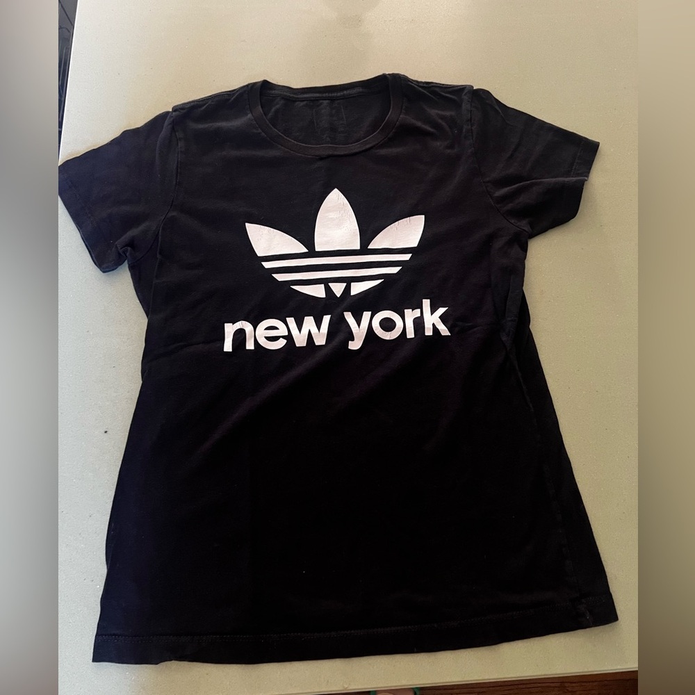 Adidas NEW YORK Tshirt, Women’s size L, but fits like a S/M. Good condition.